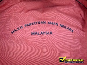 sulam belakang baju