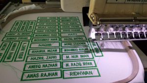 sulam name tag sekolah